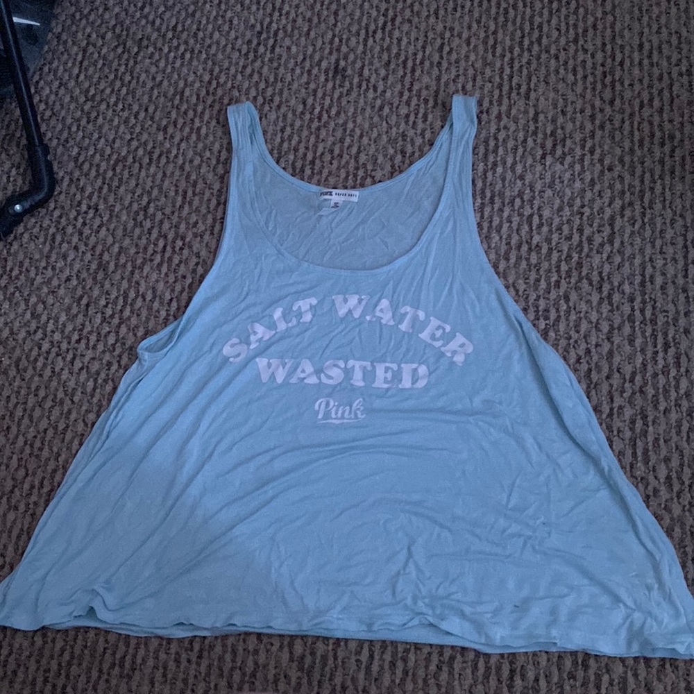 Baby blue loose tank top, worn a couple times, good condition.